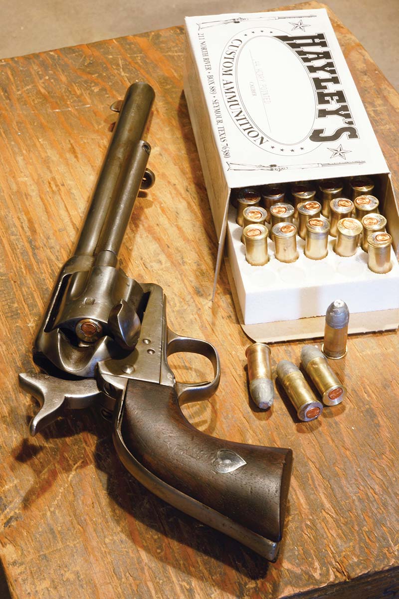 A Colt revolver and 44 Rimfire.
